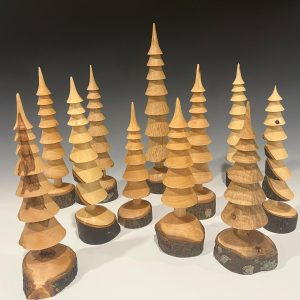 Turned wooden Christmas trees made from local cherry, pear and oak branches